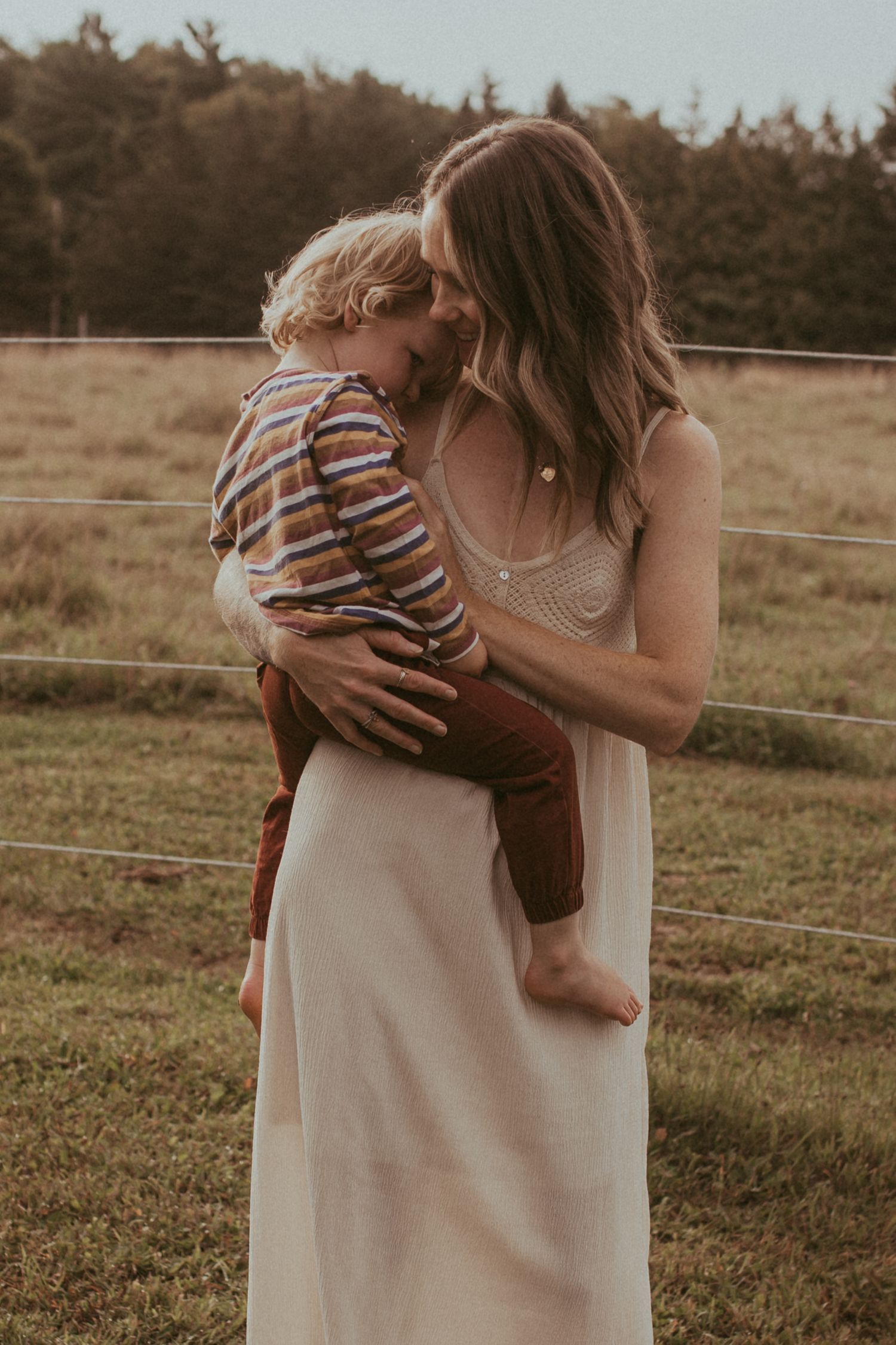 Mother and son sharing a quiet moment during a motherhood photography session in Bowmanville, Ontario