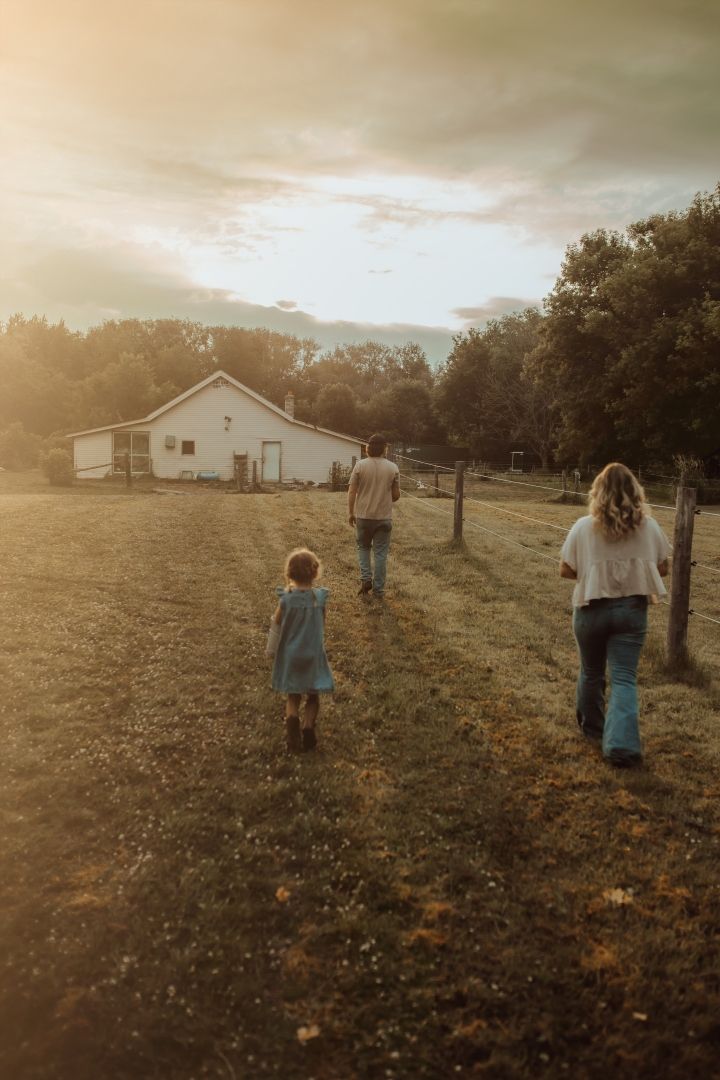 Candid and natural family session at the family farm in the early morning light taken by a Bowmanville, ON family photographer