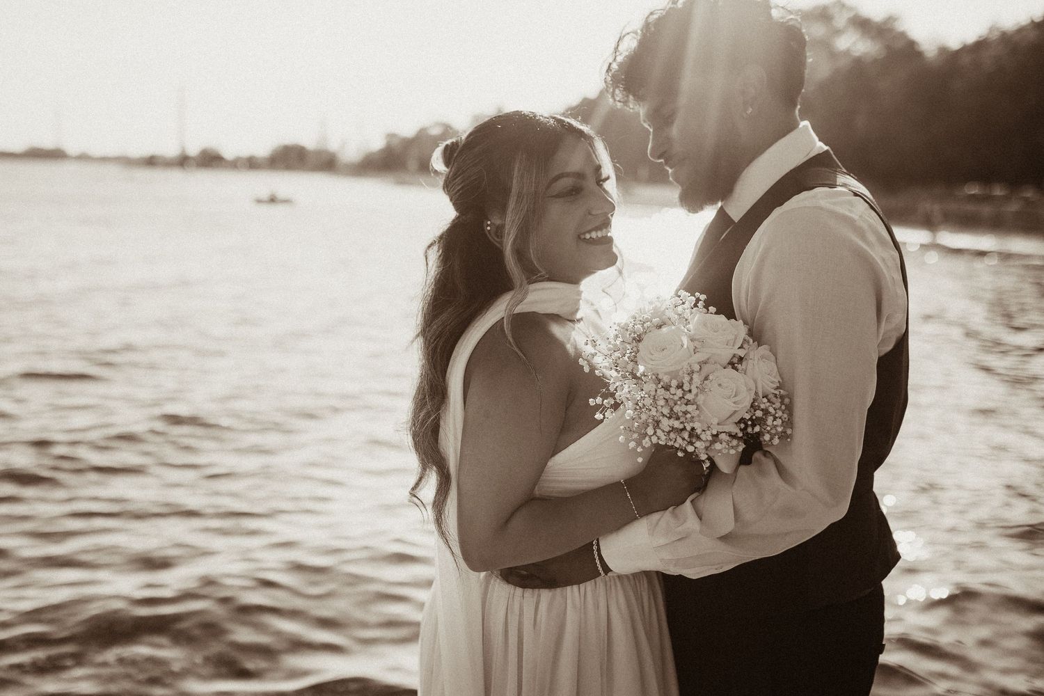 Couple sharing an intimate moment moments before their ceremony by  Durham Region wedding photographer