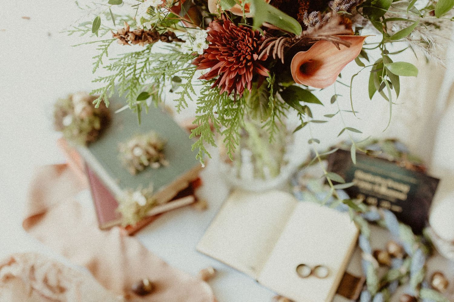 Details shot of wedding flowers, rings, and other wedding decor by documentary wedding photographer Durham Region