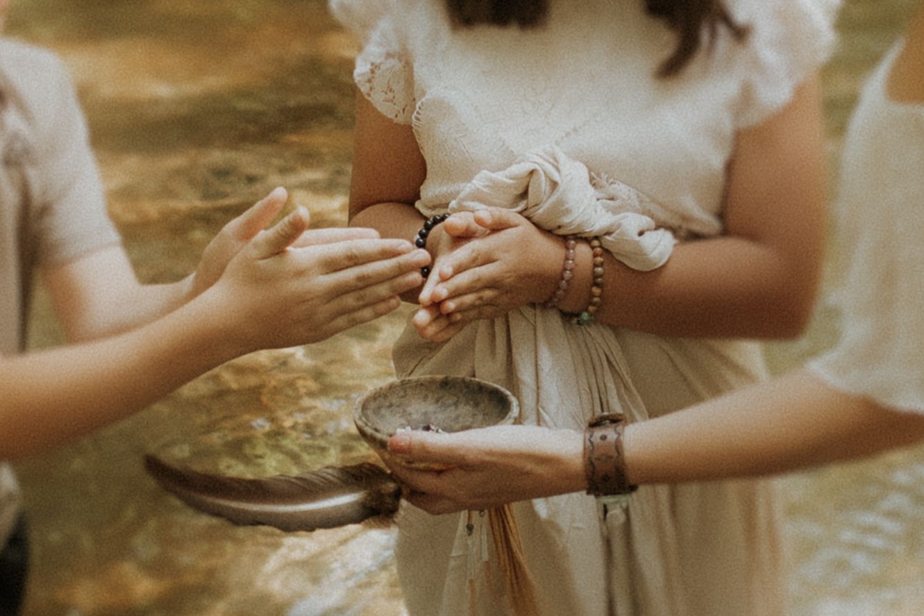 Mother and two kids performing an Indigenous saging ceremony by Bowmanville, ON family photographer
