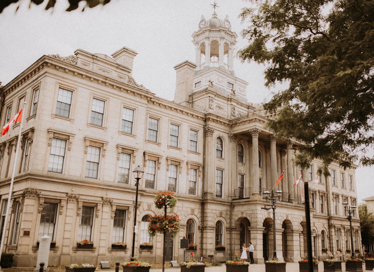 A grand photo of the outside of Victoria Hall by Cobourg Elopement Photographer