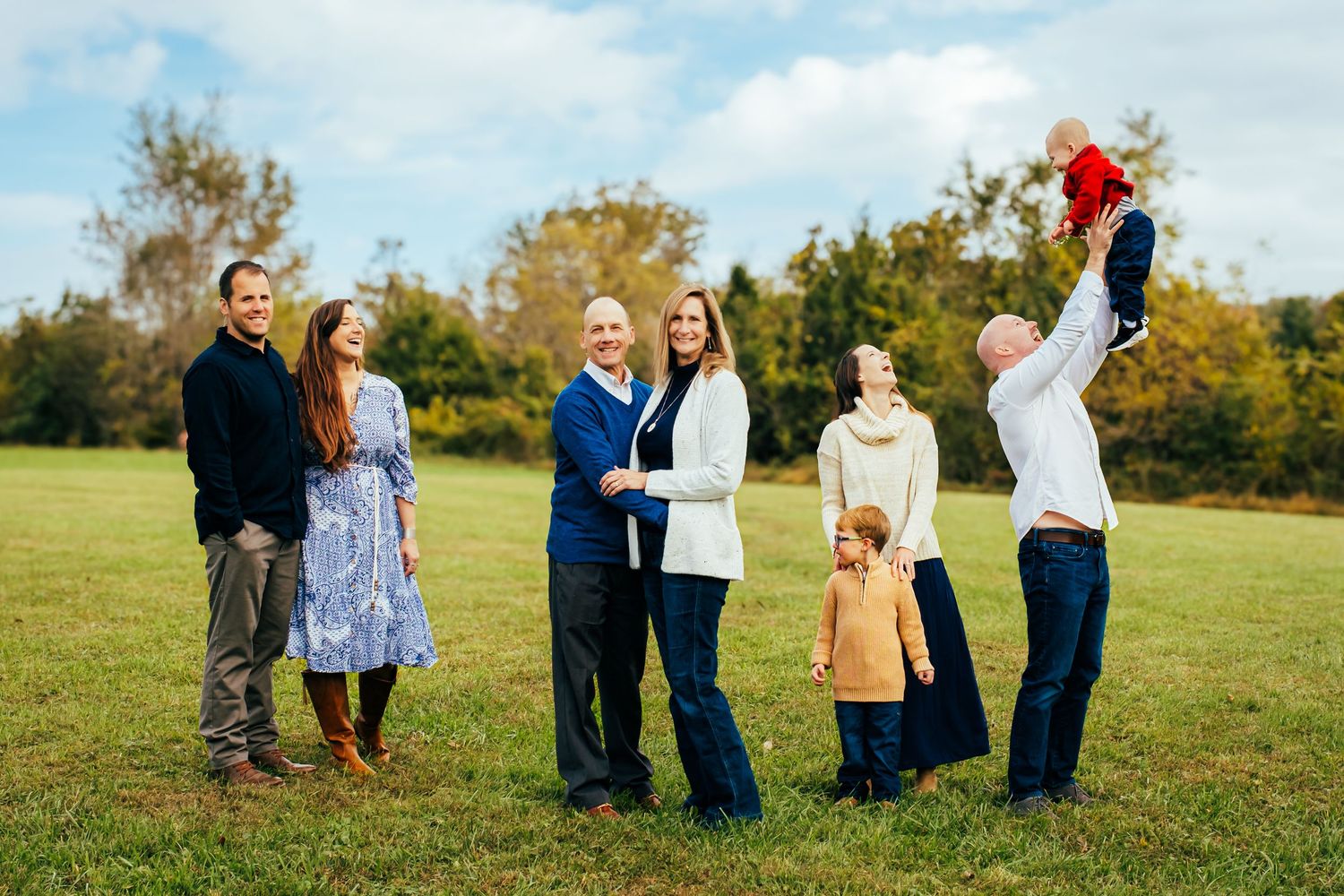 Collage of outdoor autumn engagement photos showing couples posing together in a grassy field on a sunny day.
