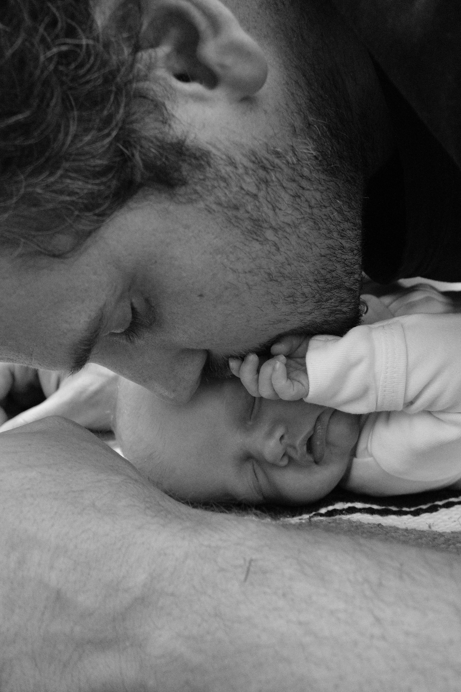 Black and white close-up sequence of a sleeping baby.