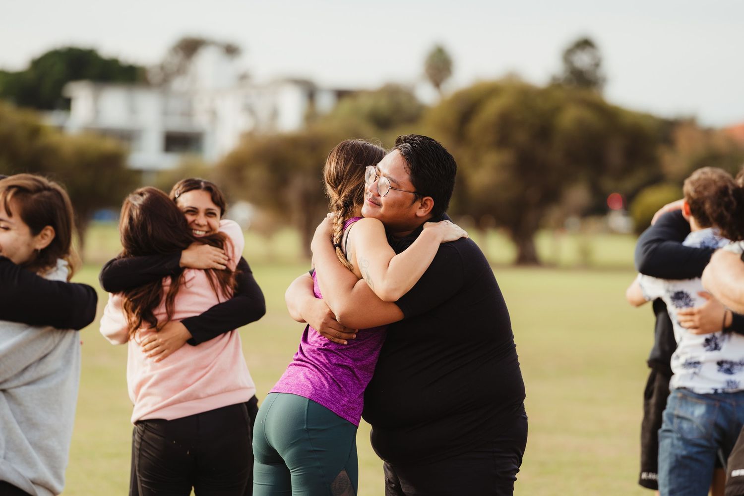Asana Breathwork people hugging