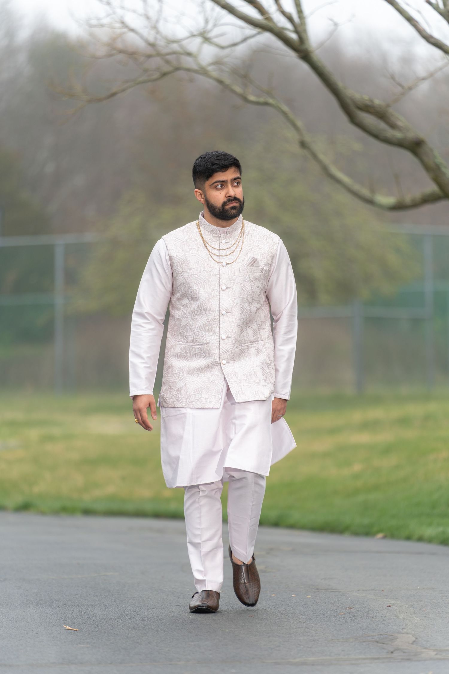 A sequence of photos showing a person in traditional white attire walking outdoors.