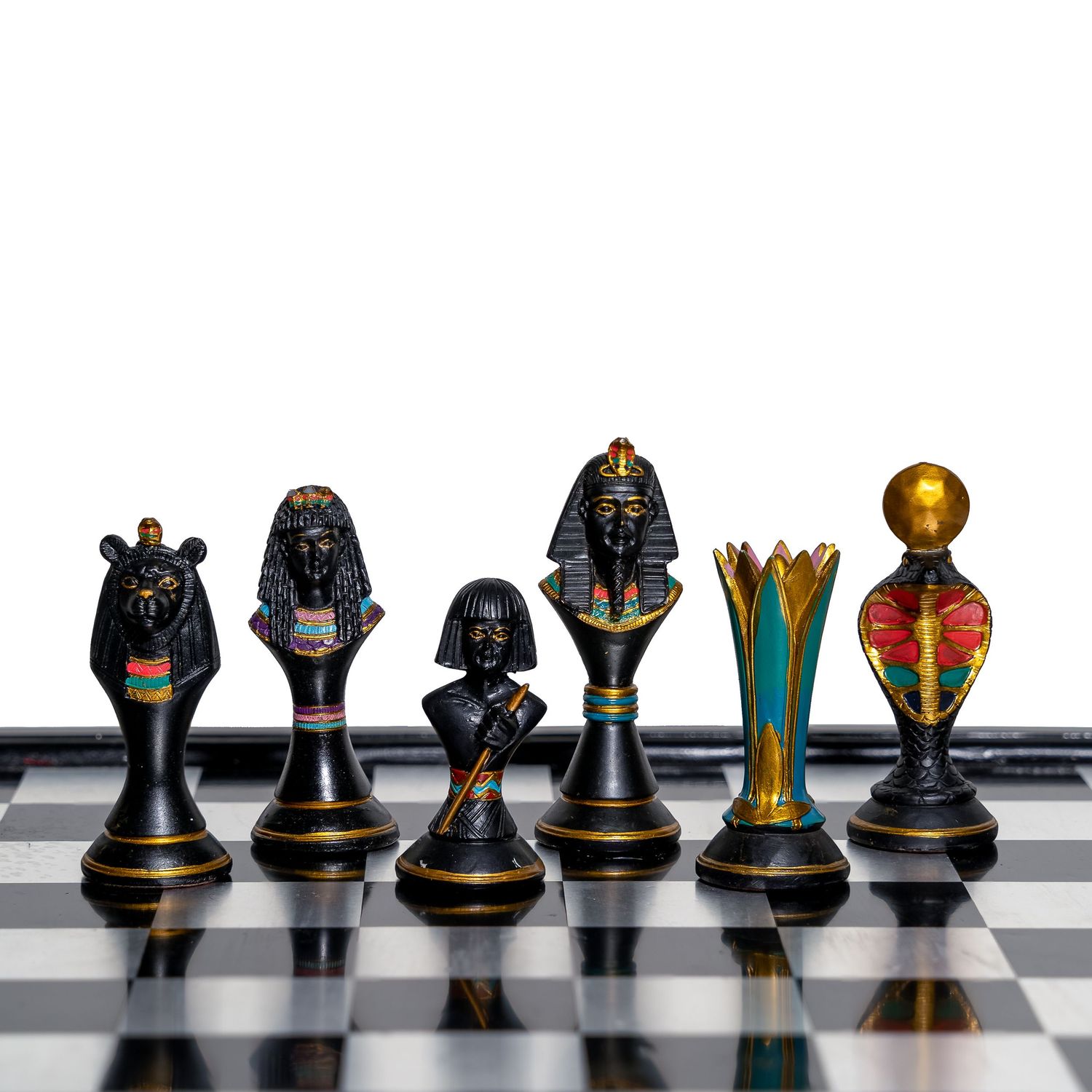 Black and gold Egyptian-style chess pieces lined up in panoramic view.