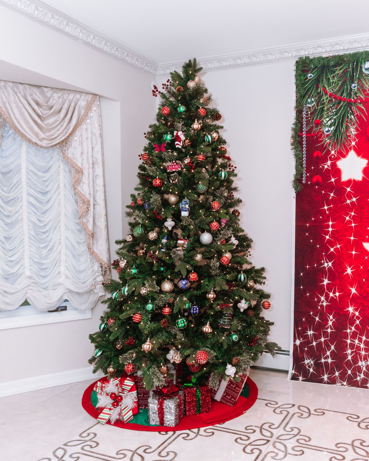 Sequence of four photos showing a decorated Christmas tree with presents underneath against a white wall with red curtains.