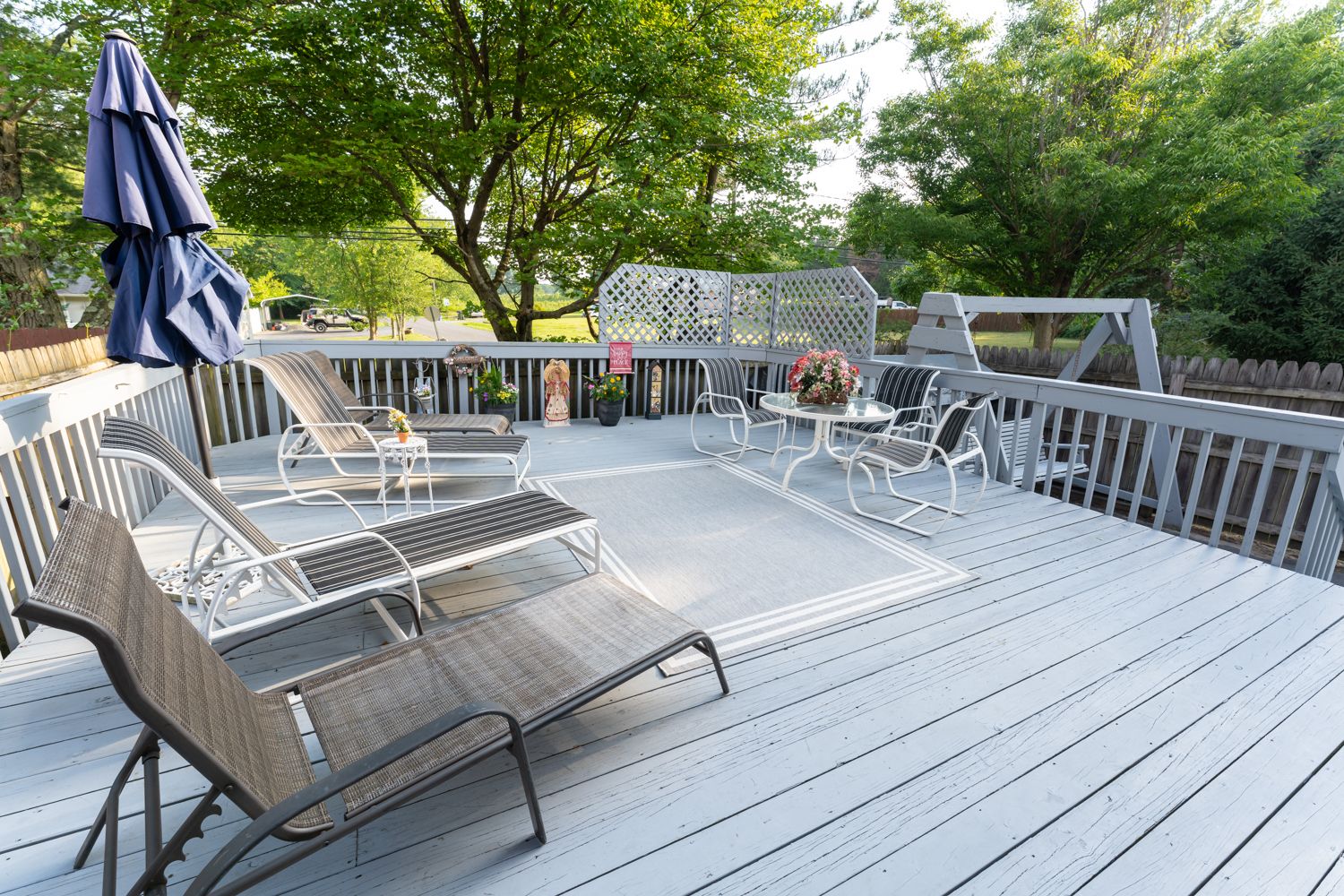 A series of deck photos showing outdoor lounge chairs and gray wooden decking on a residential patio space.
