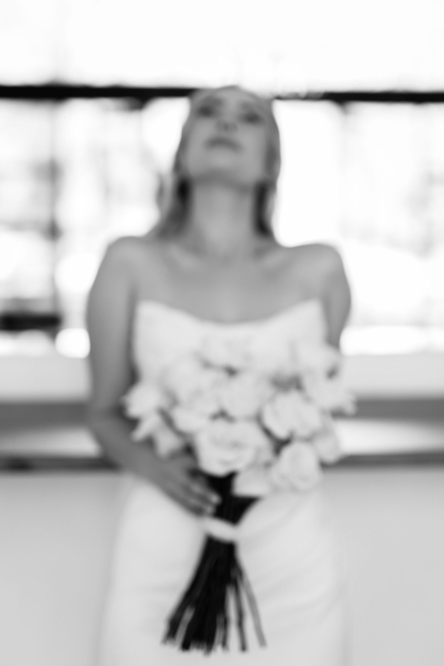 A black and white series of cropped wedding photos showing brides holding bouquets at different angles.