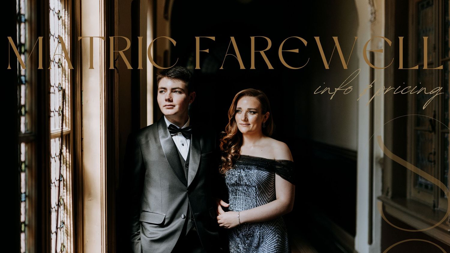A formal couple poses in an elegant hallway with ornate mirrors and classical architectural details.