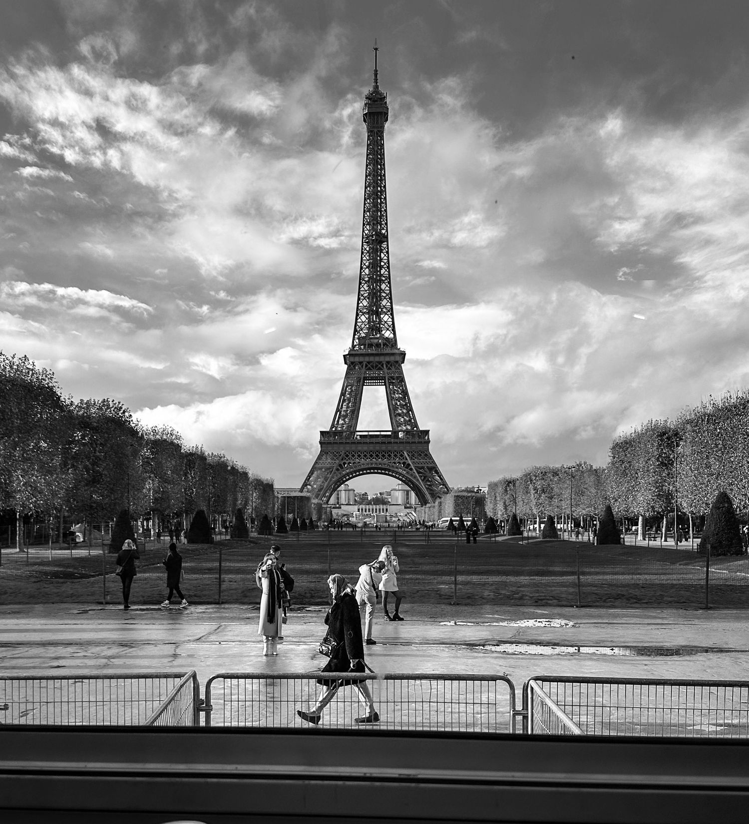 The eiffel tower and a portentous skyline of Paris.