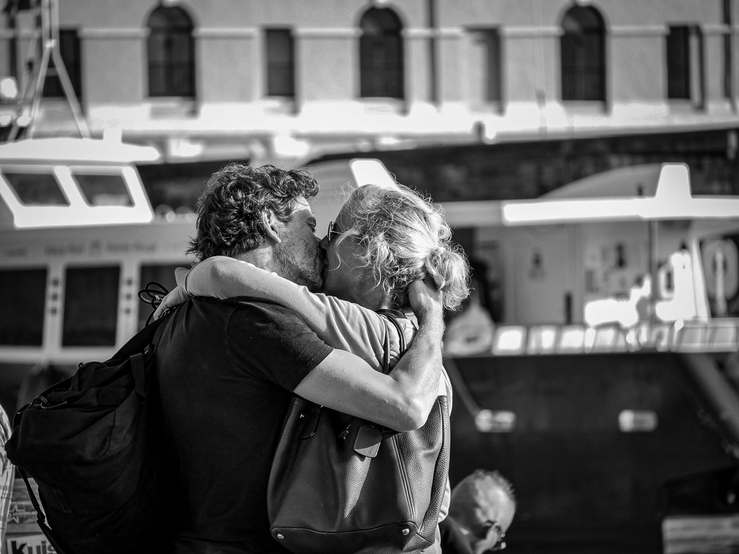 A kiss in by the boats in Vieux Port, Manchester.