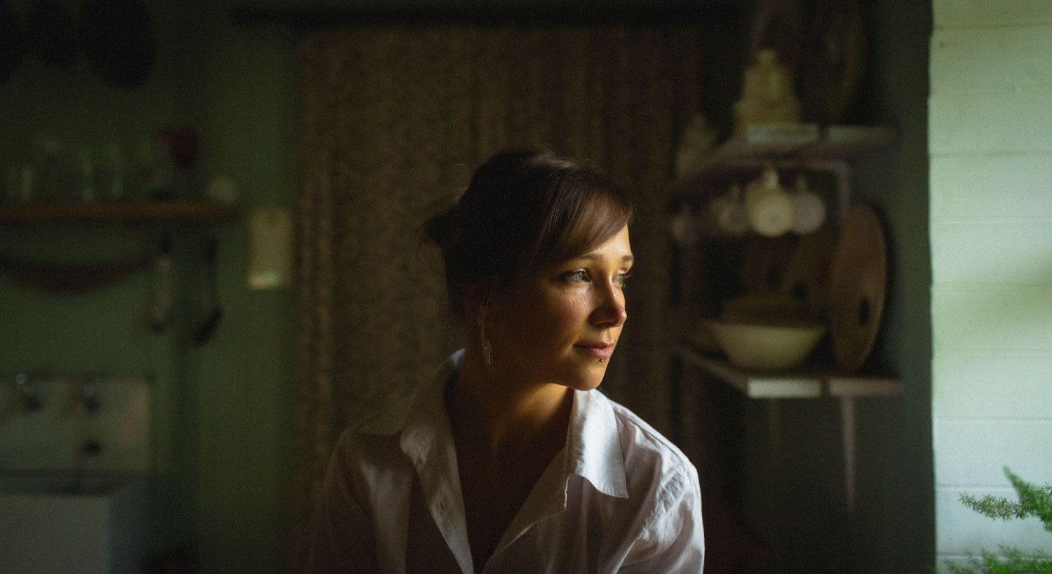 Close-up portrait of a woman with a calm expression looking to the side, professional portrait photography in Ireland