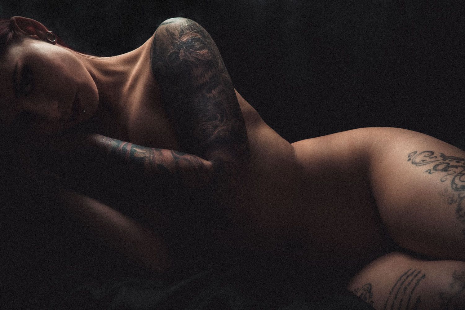 Artistic and personal portrait capturing quiet confidence and timeless style of nude woman