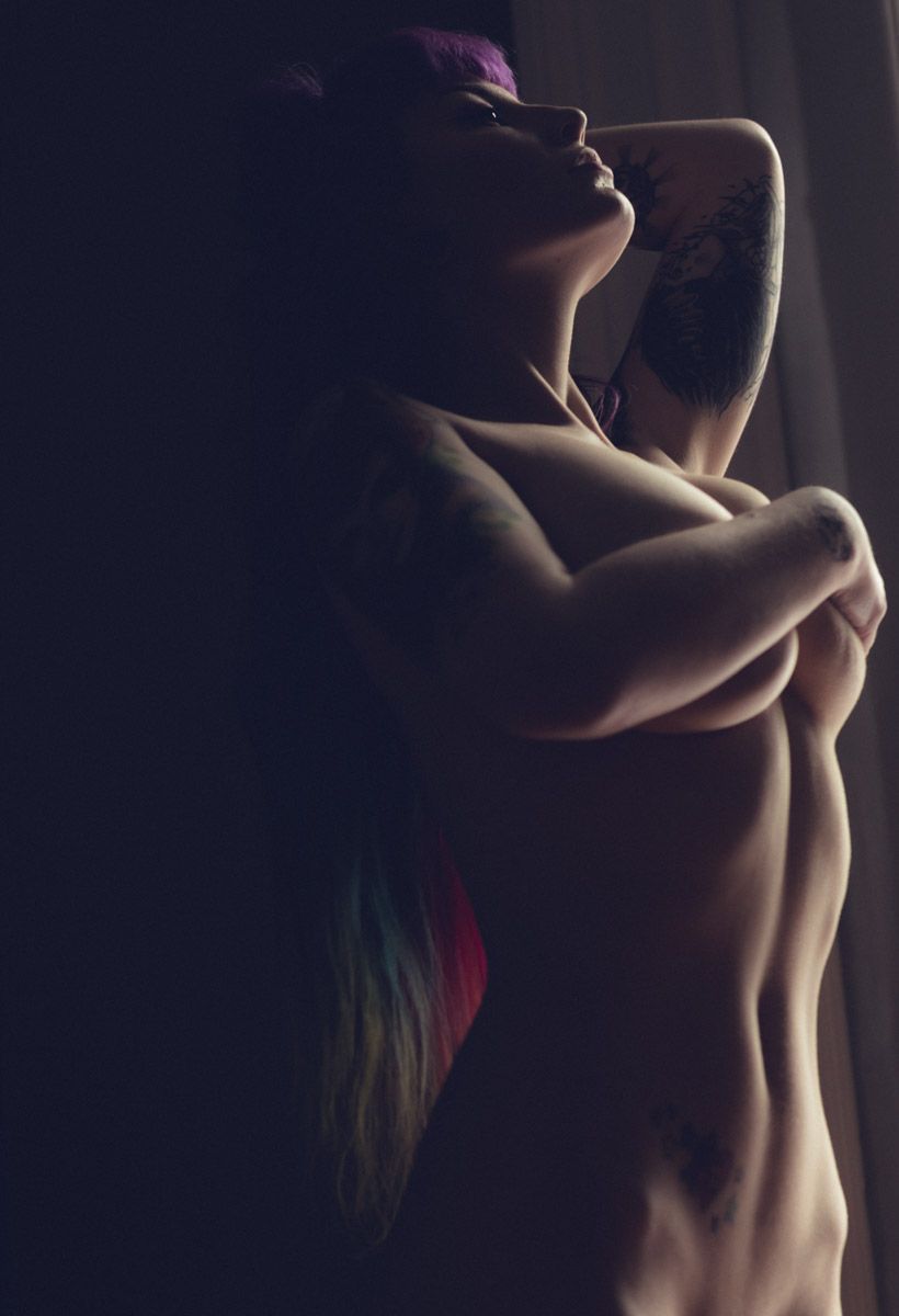 Elegant artistic portrait highlighting curves, presence, and timeless photography style by Subversephoto