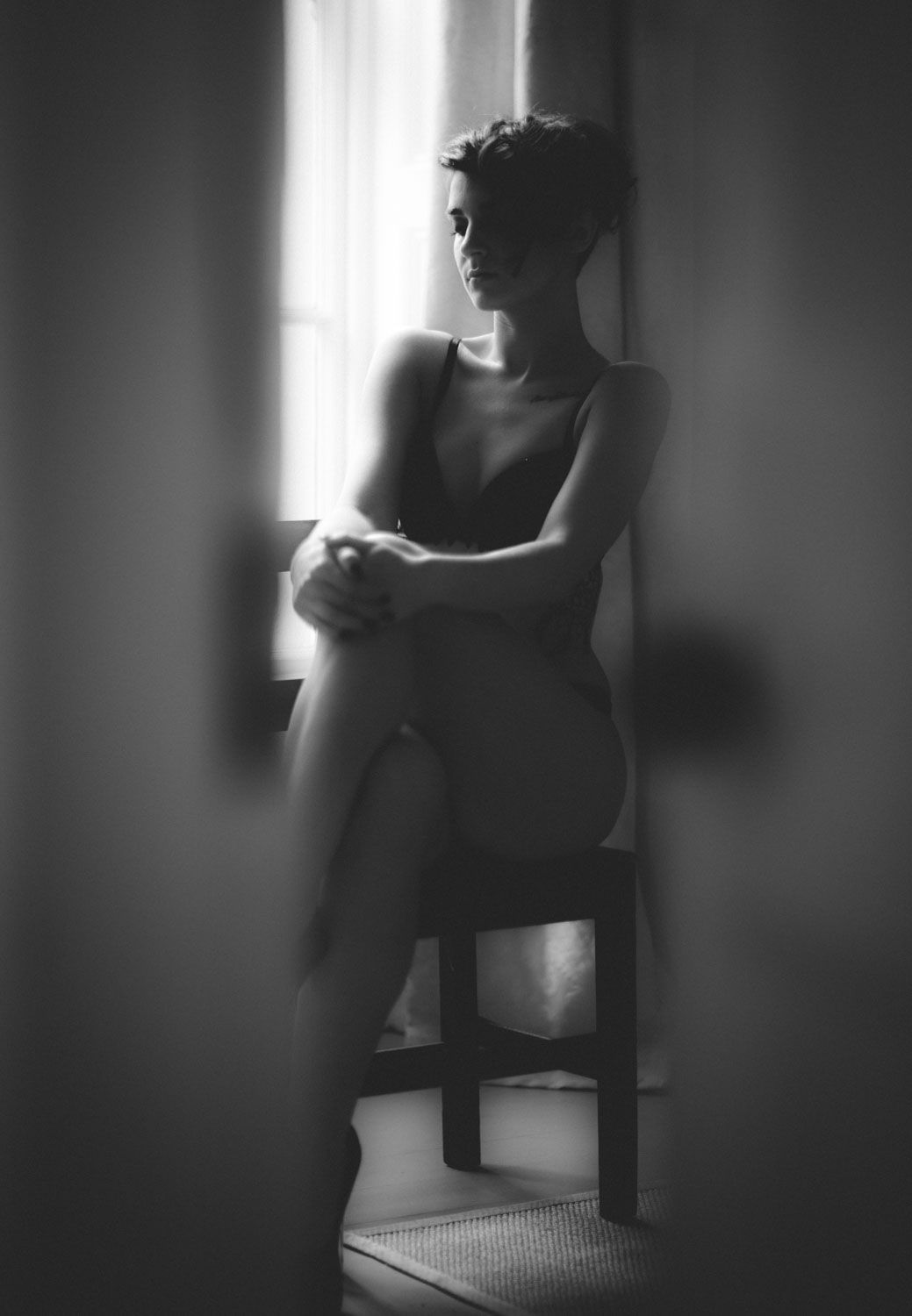 Fine art portrait emphasizing mood, presence, and artistic composition.