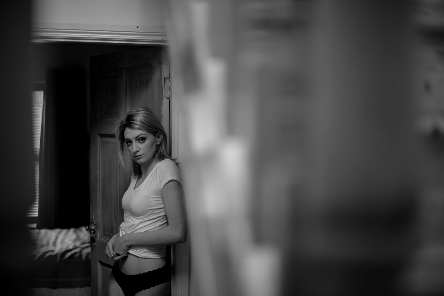 Black and white female portrait with direct eye contact, fine art photography by subversePhoto.