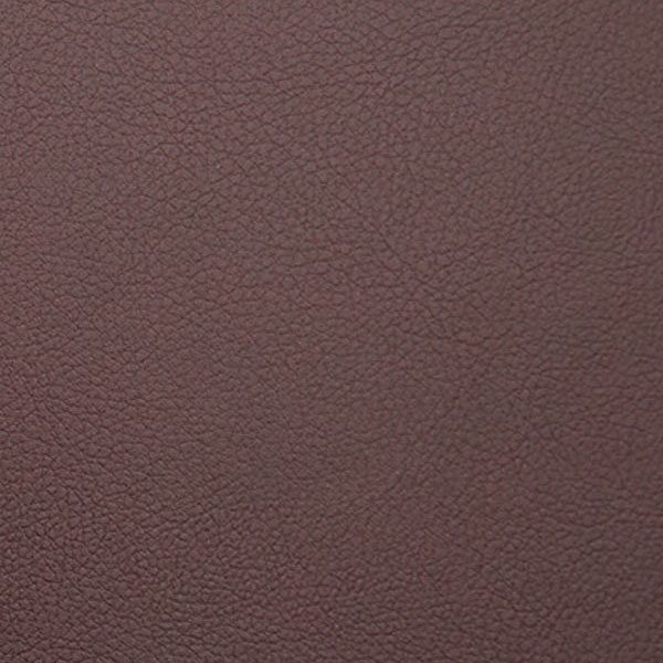 Close up texture of brown leather material showing natural grain pattern and surface details.
