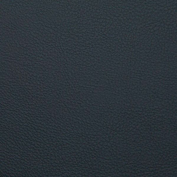 Dark textured leather background with a grainy surface pattern and subtle variations in black coloring.