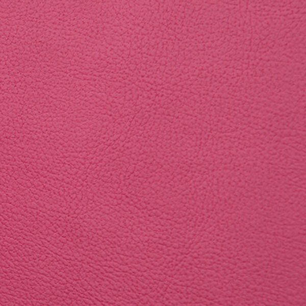 Close-up texture of pink leather material showing a fine grain pattern and smooth surface.