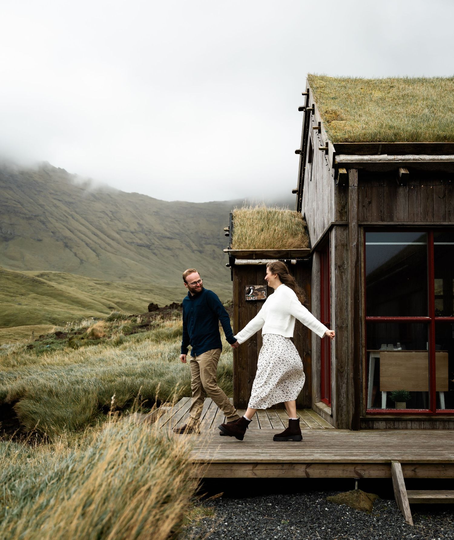 A series of progressive images showing someone opening a rustic wooden door in a mountainous landscape setting.
