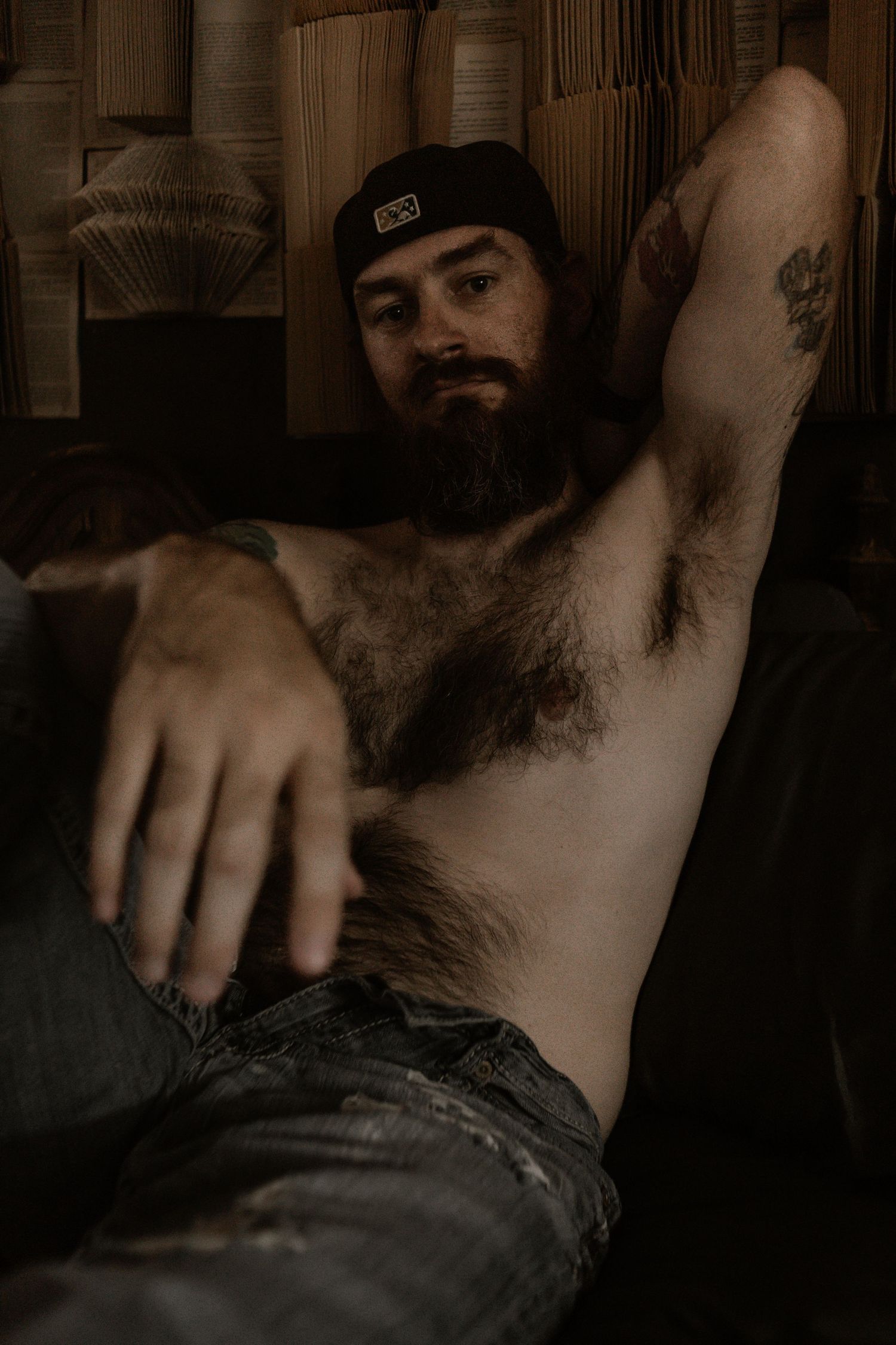 Close-up photo series showing a person's torso and arm against a dark background. Couples boudoir Tucson.
