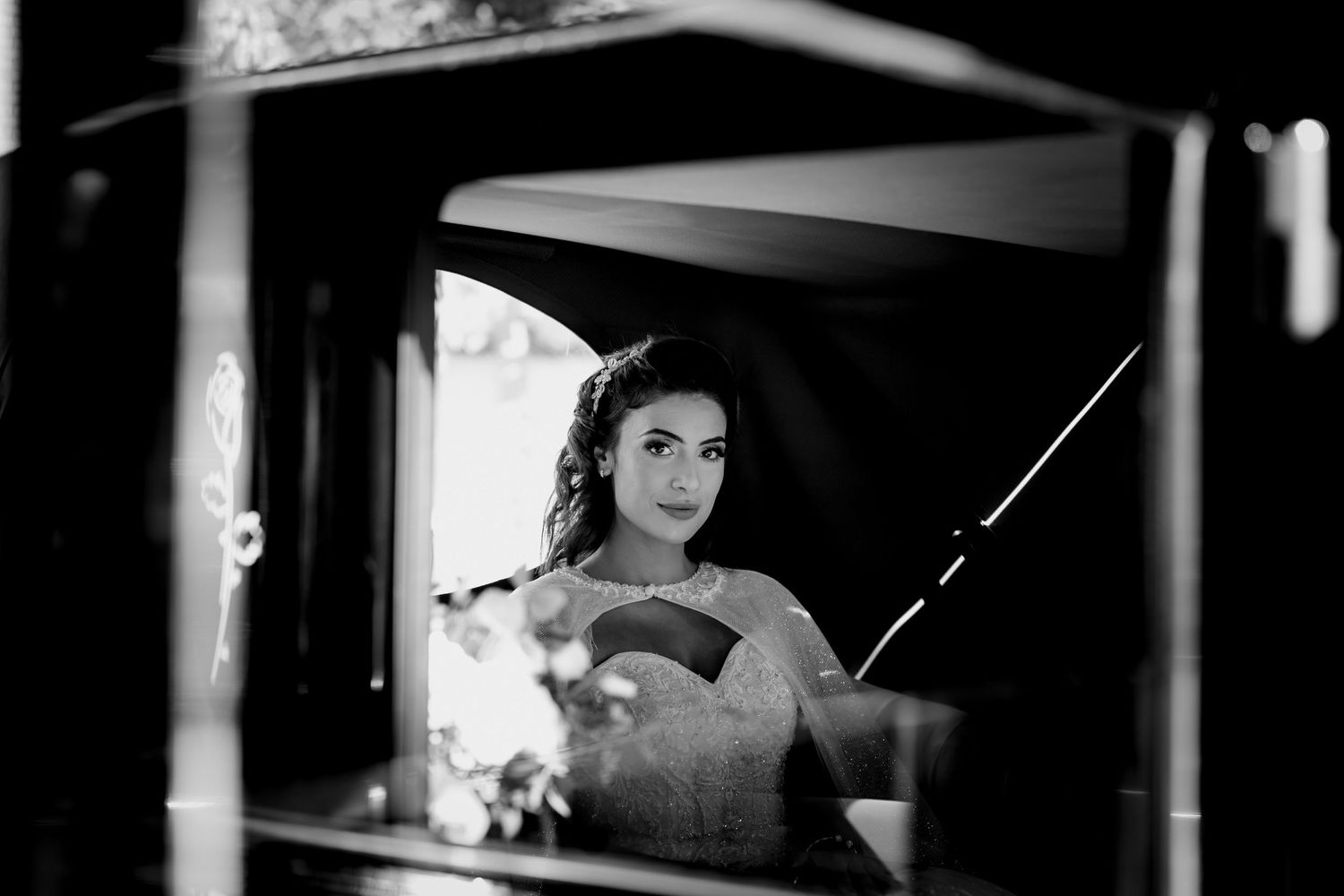 Bride arriving in a classic car at Huntingdon Registry Office.