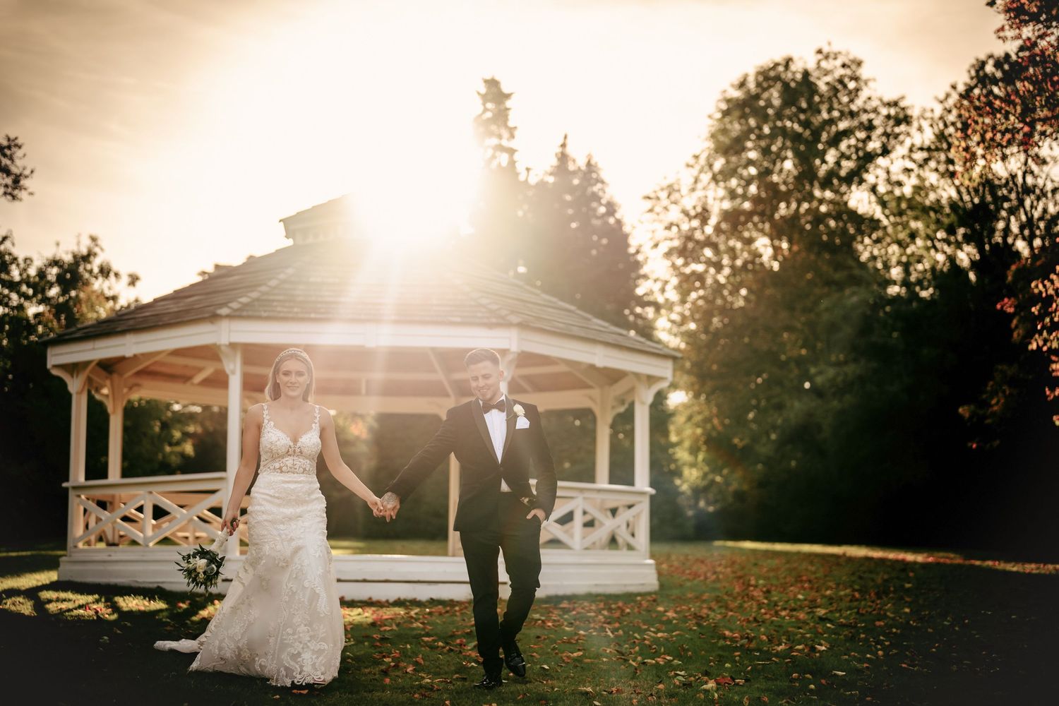 Modern couple photo at Holmewood Hall sunset pagoda in Cambridgeshire.