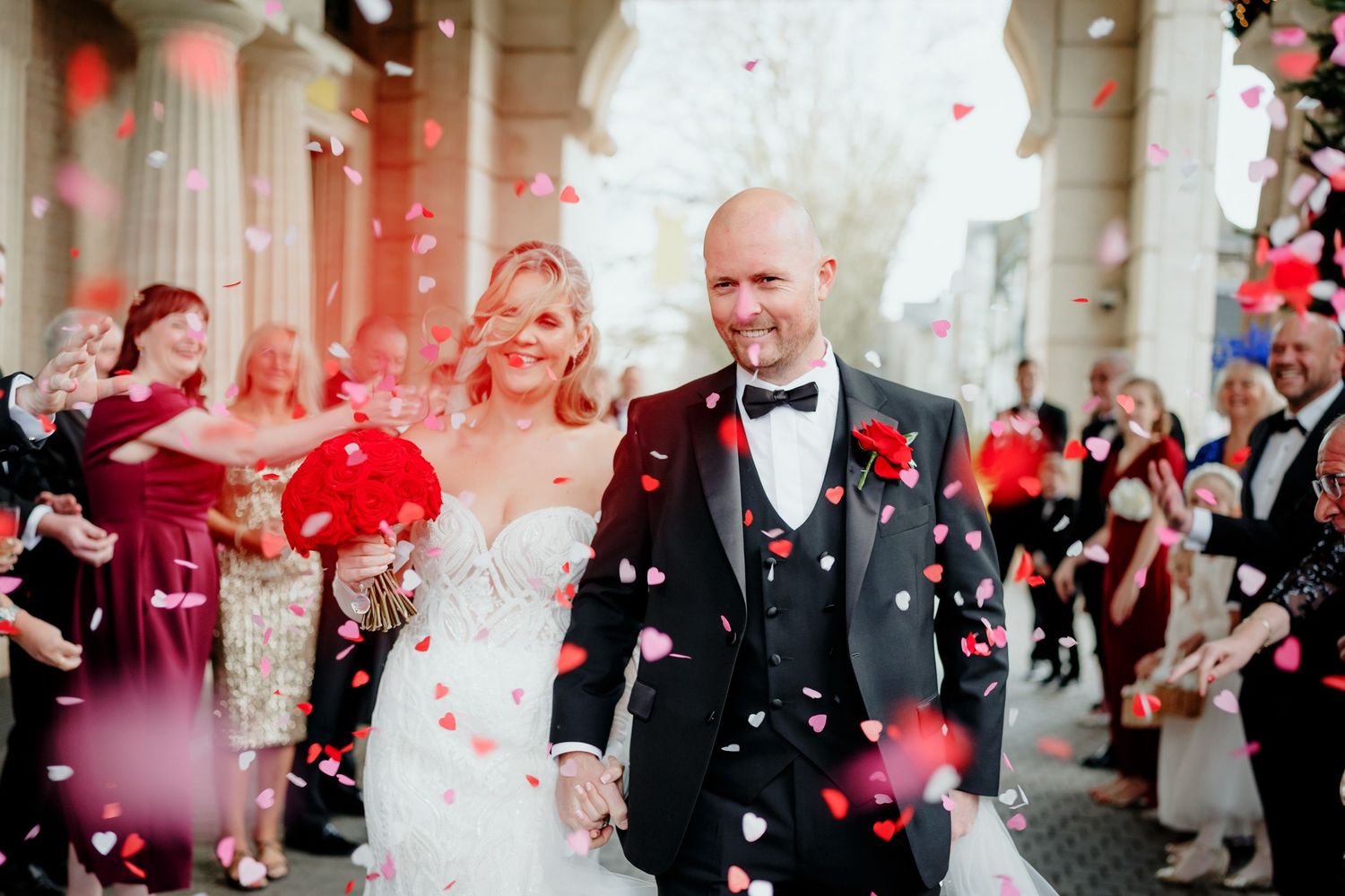 Confetti run outside the University Arms, a premier wedding photography location in Cambridge.