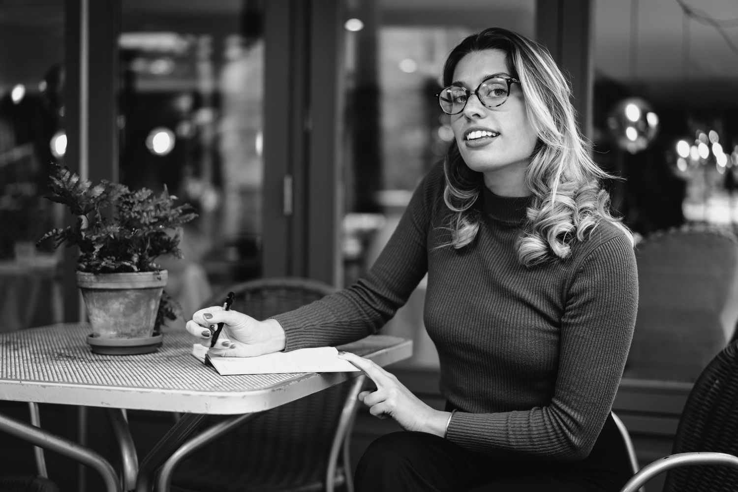 Local business branding shoot in Huntingdon featuring a relaxed portrait in a cafe setting.