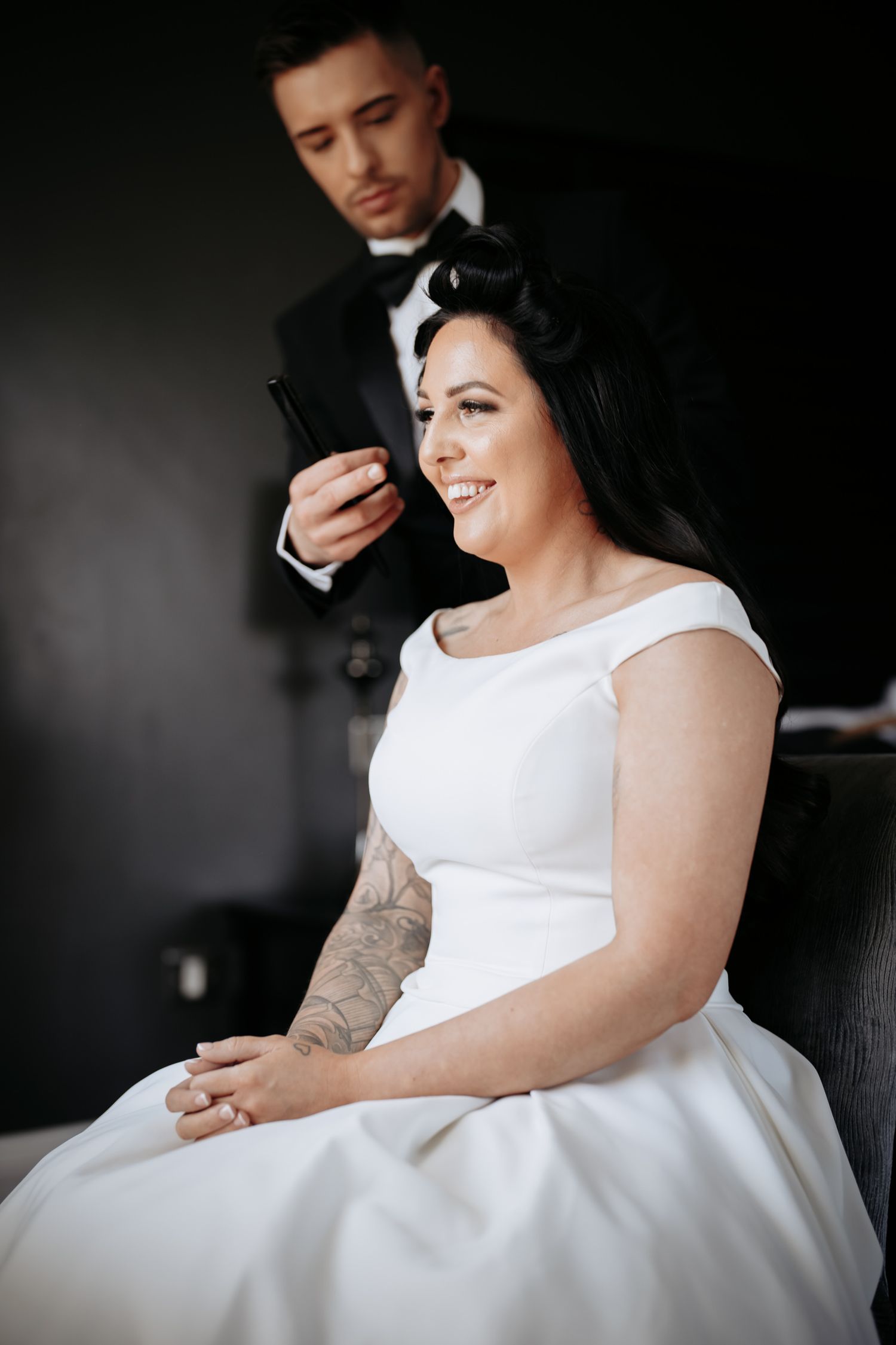 Bridesmaid makeup and hair finishing touches at Swynford Manor.
