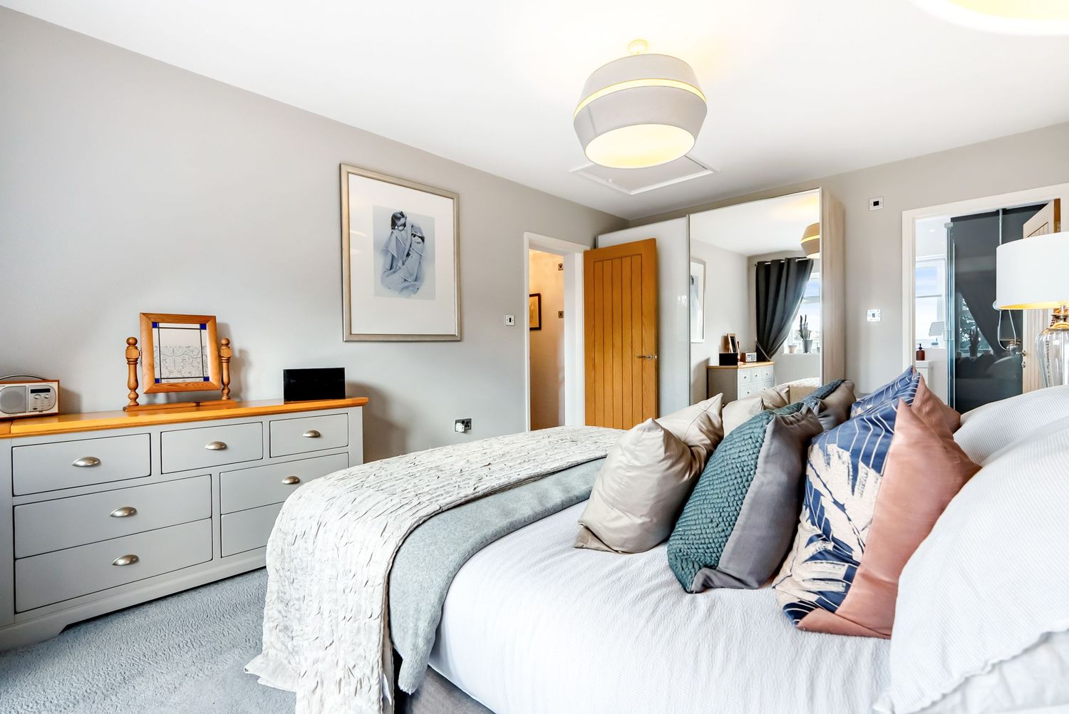 Master bedroom styling photography for property listings.