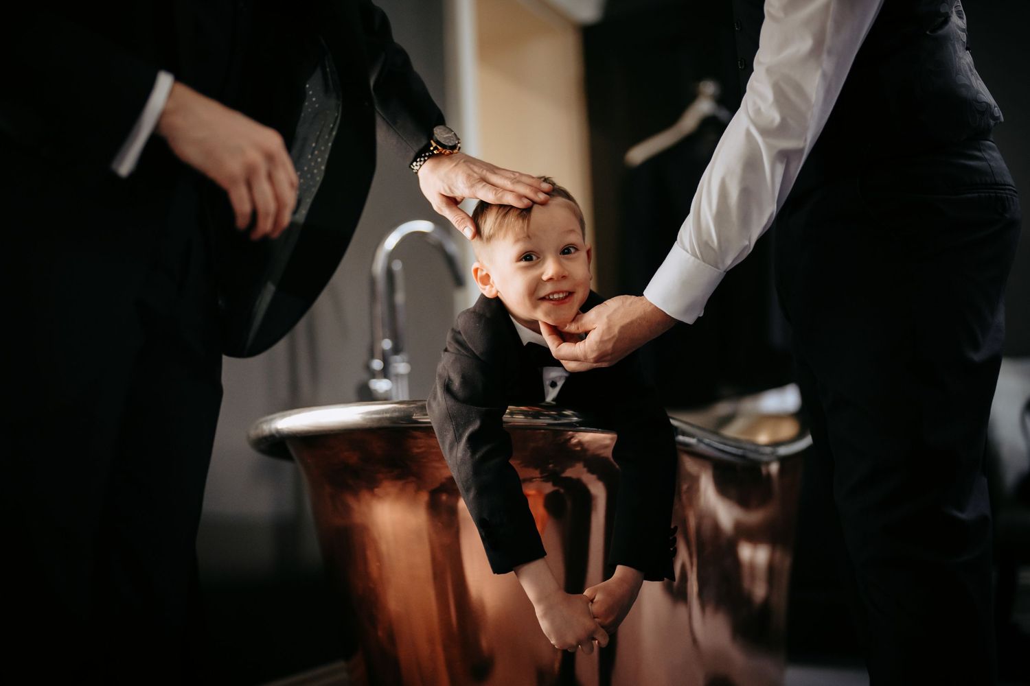 Fun getting ready wedding photo with kids at Swynford Manor, Newmarket.