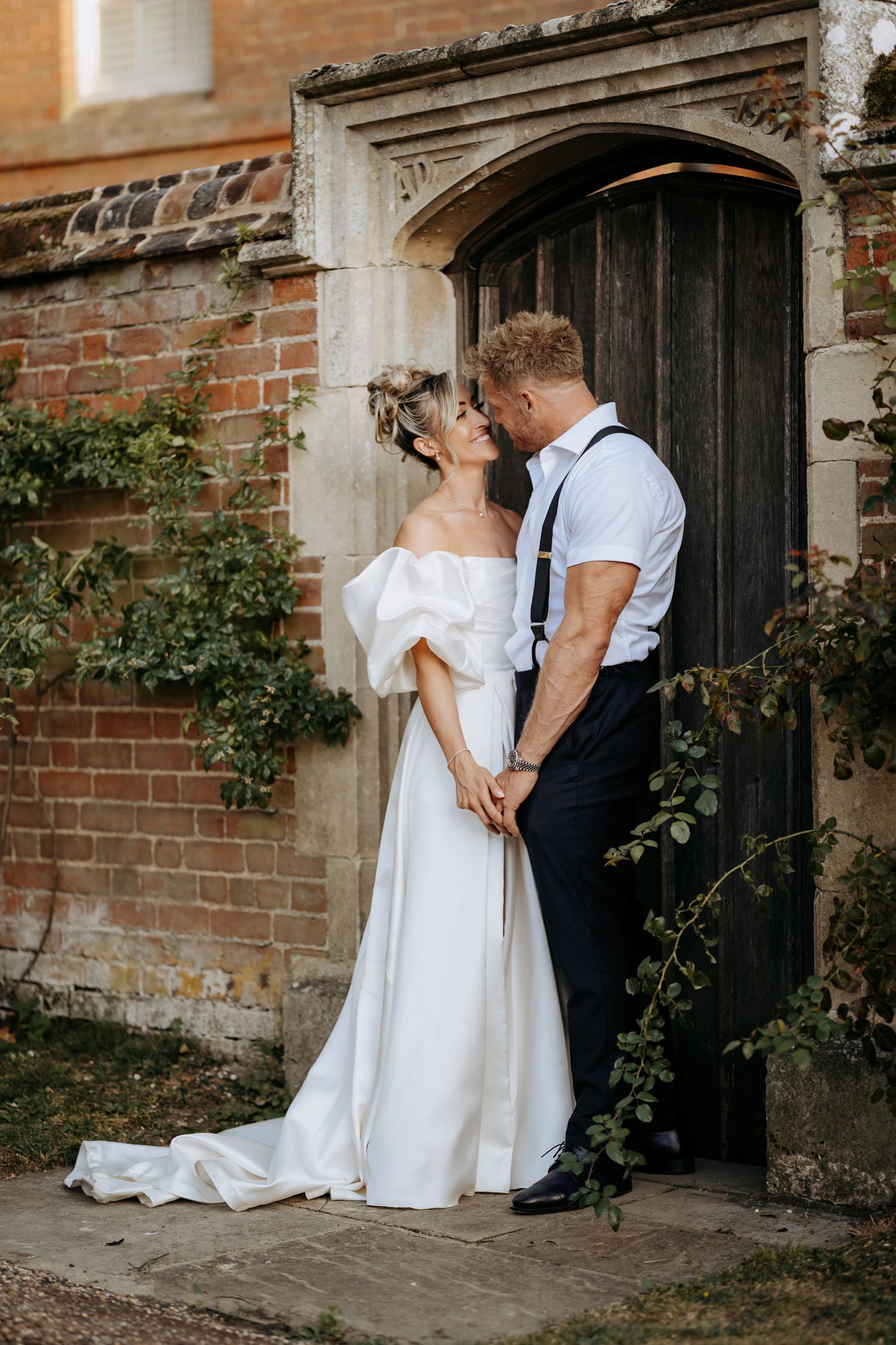 Luxury wedding photography capturing natural moments at Longstowe Hall, Cambridge.