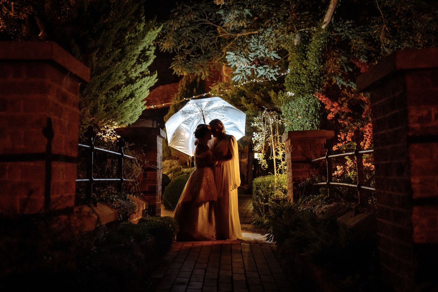 Creative night wedding photography on a bridge in Bedford.