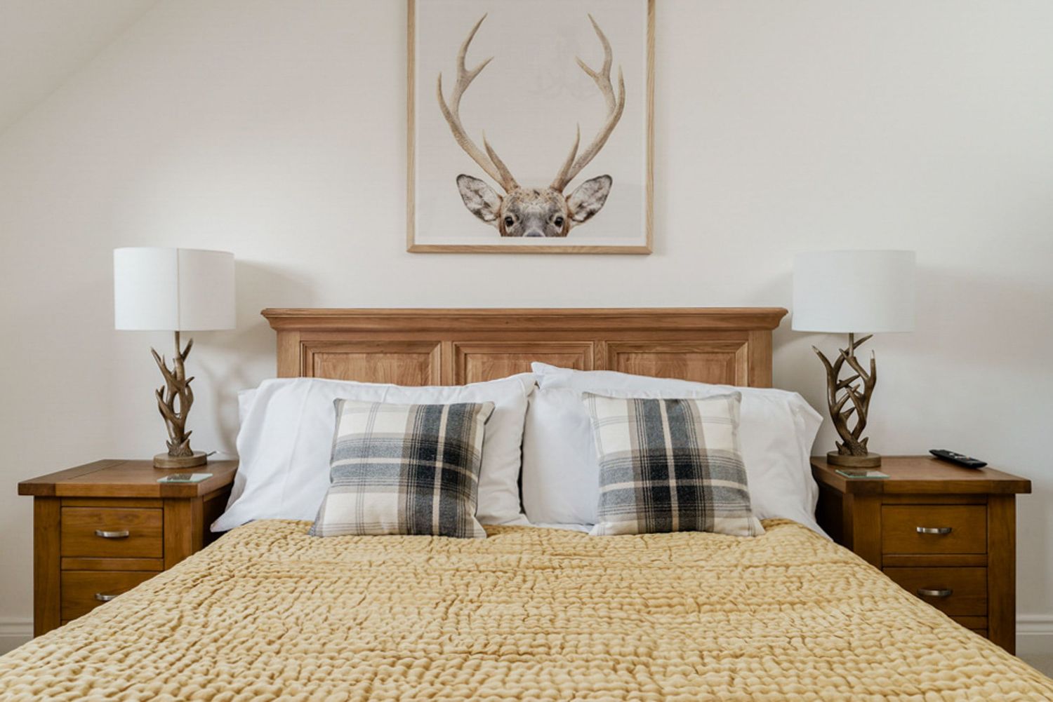 Cozy bedroom interior styling photography for holiday lets.