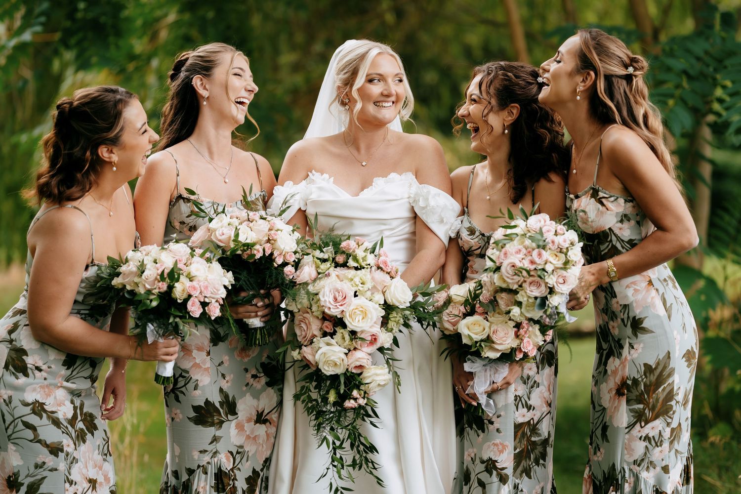 Natural light photo of bridesmaids laughing in Huntingdon.