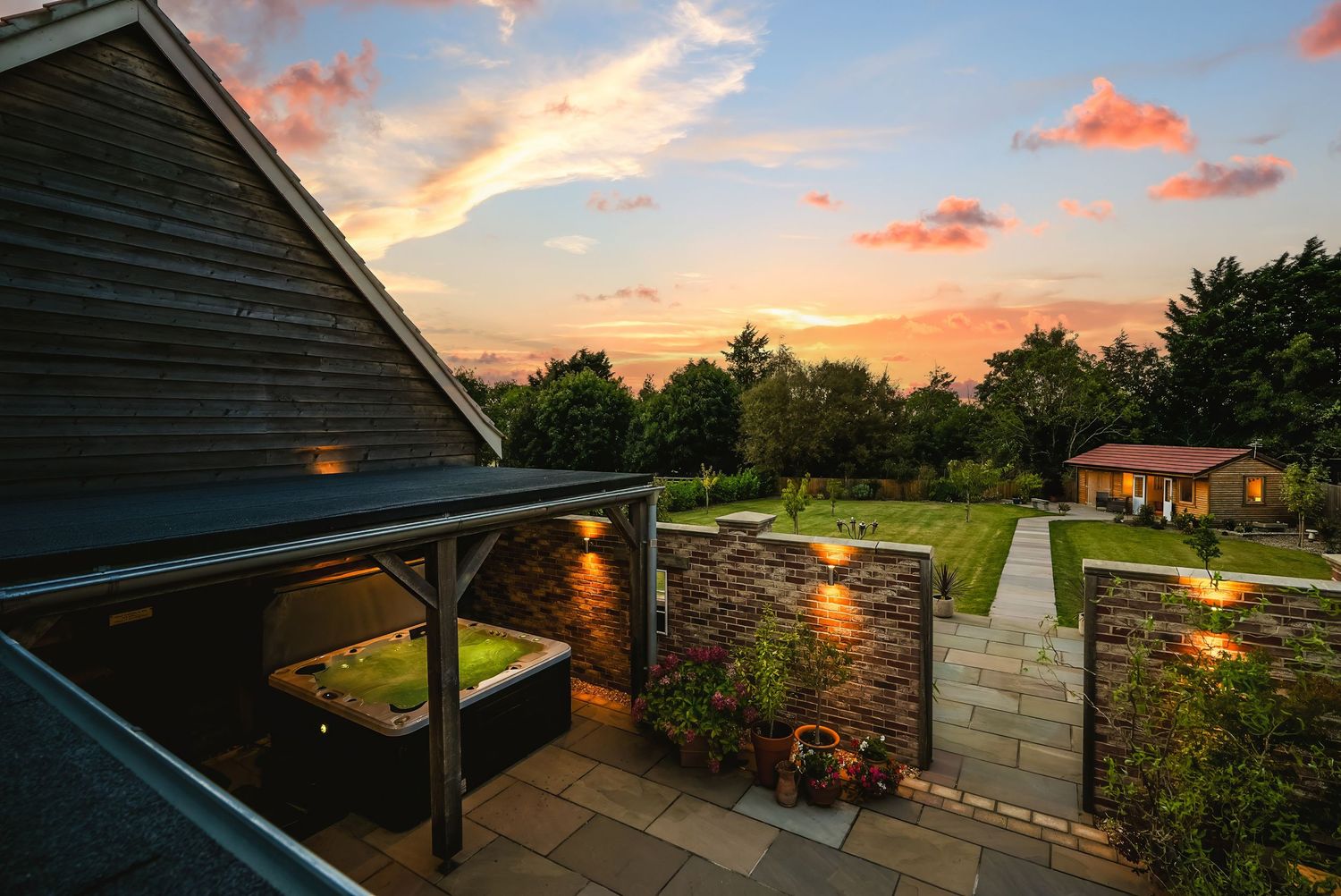Beautiful sunset view from a garden balcony property photo in St Neots.