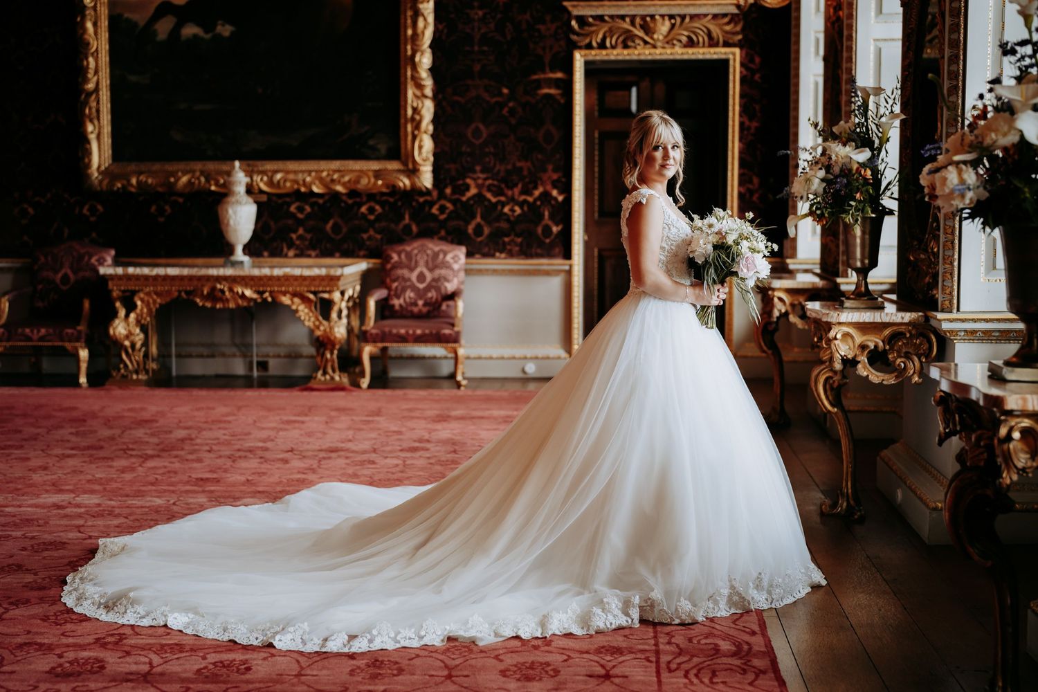 Stunning bride with a beautiful dress, classic and elegant wedding photo.