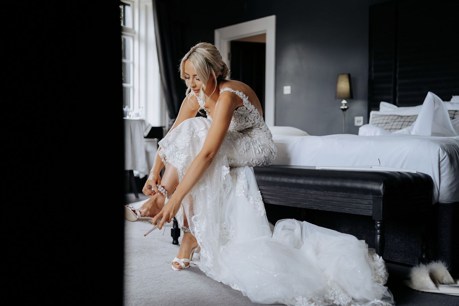 Stunning bride getting ready in the bridal suite at Swynford Manor, Newmarket.