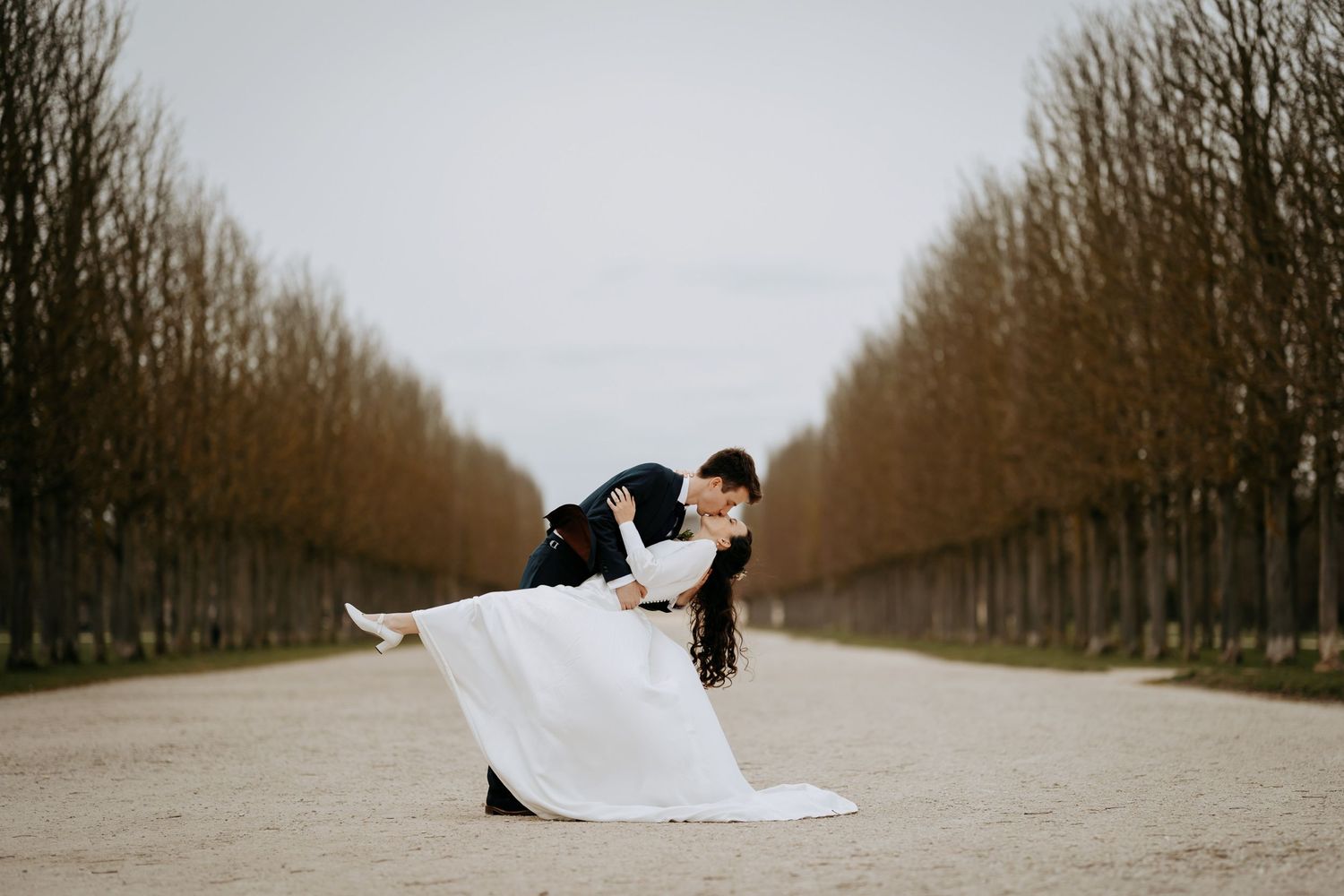 Romantic wedding dip pose photography in Cambridgeshire.