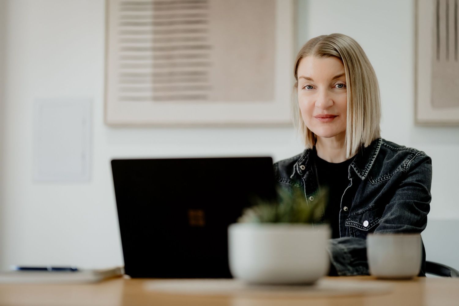 Female business leader portrait in an environmental office style.
