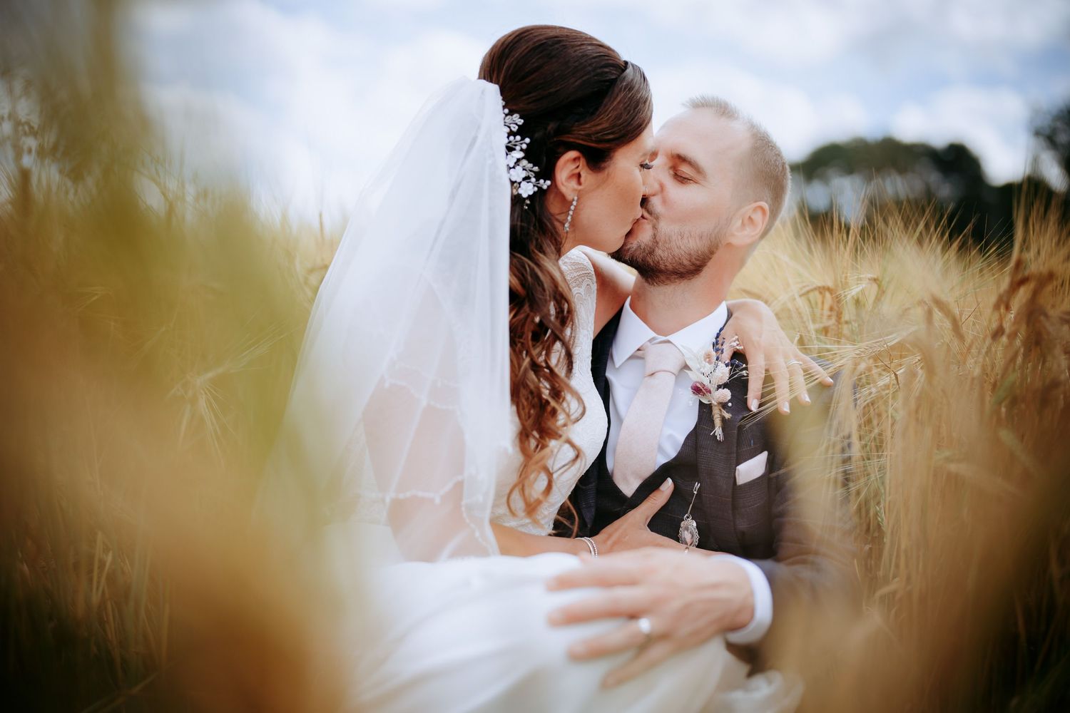 Couple in a hay field near The Thatch Barn, Yelling.