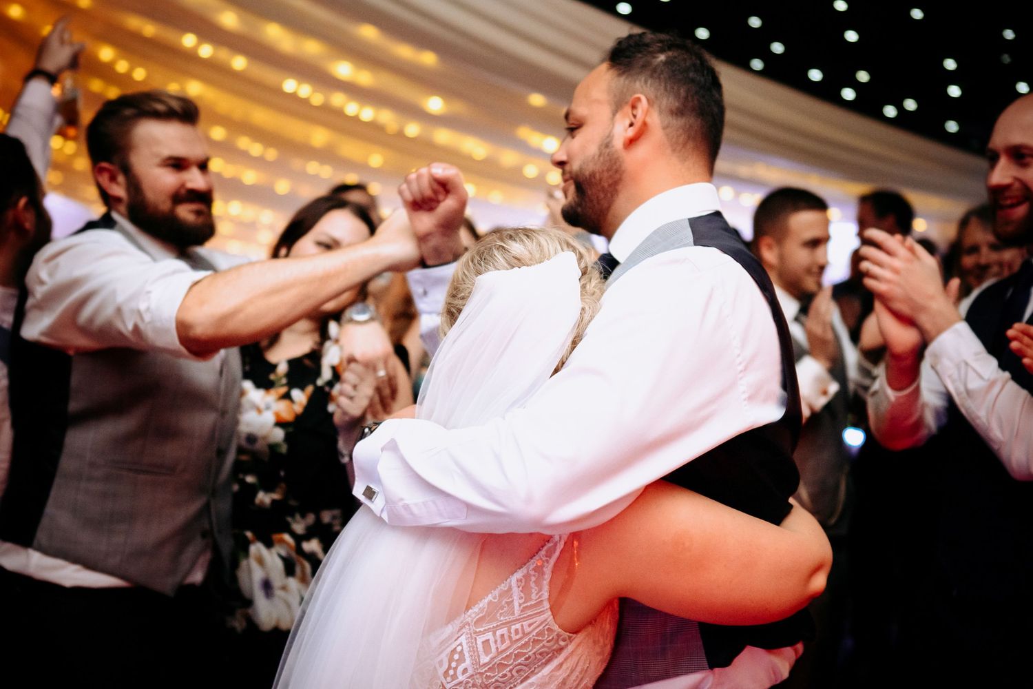 First dance photo under a marquee at Chippenham Park wedding, Newmarket.