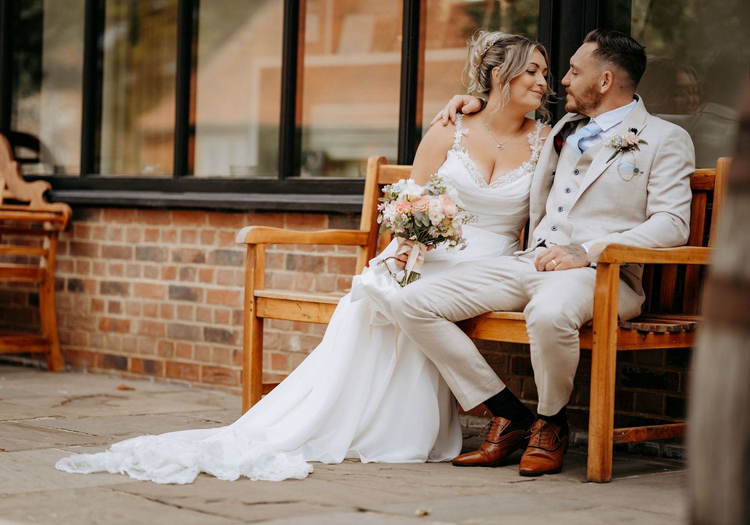 Natural couple moment together on a bench at Granary Estates, Newmarket.