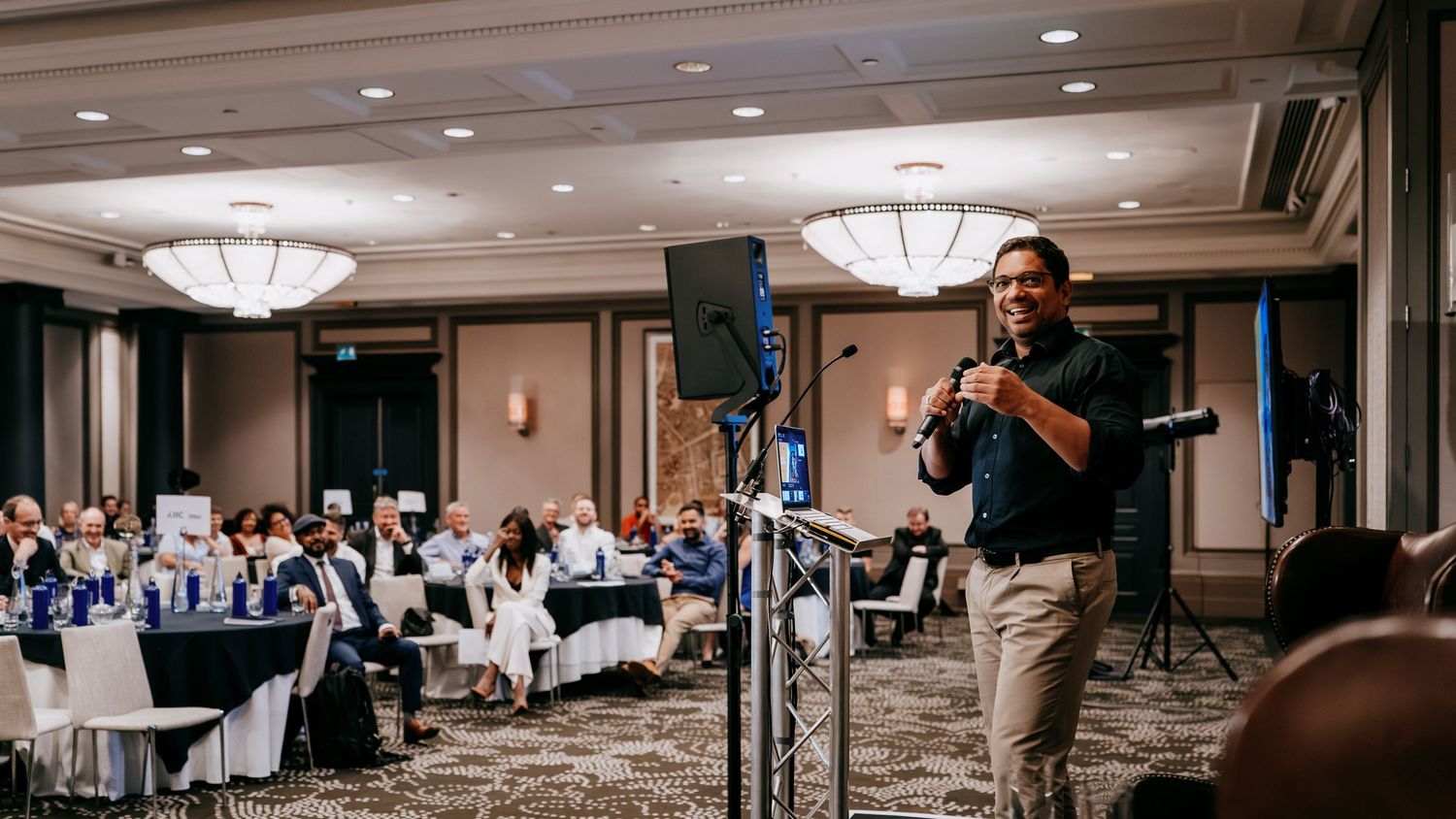 Guest speaker photography at a business conference in a Cambridge hotel