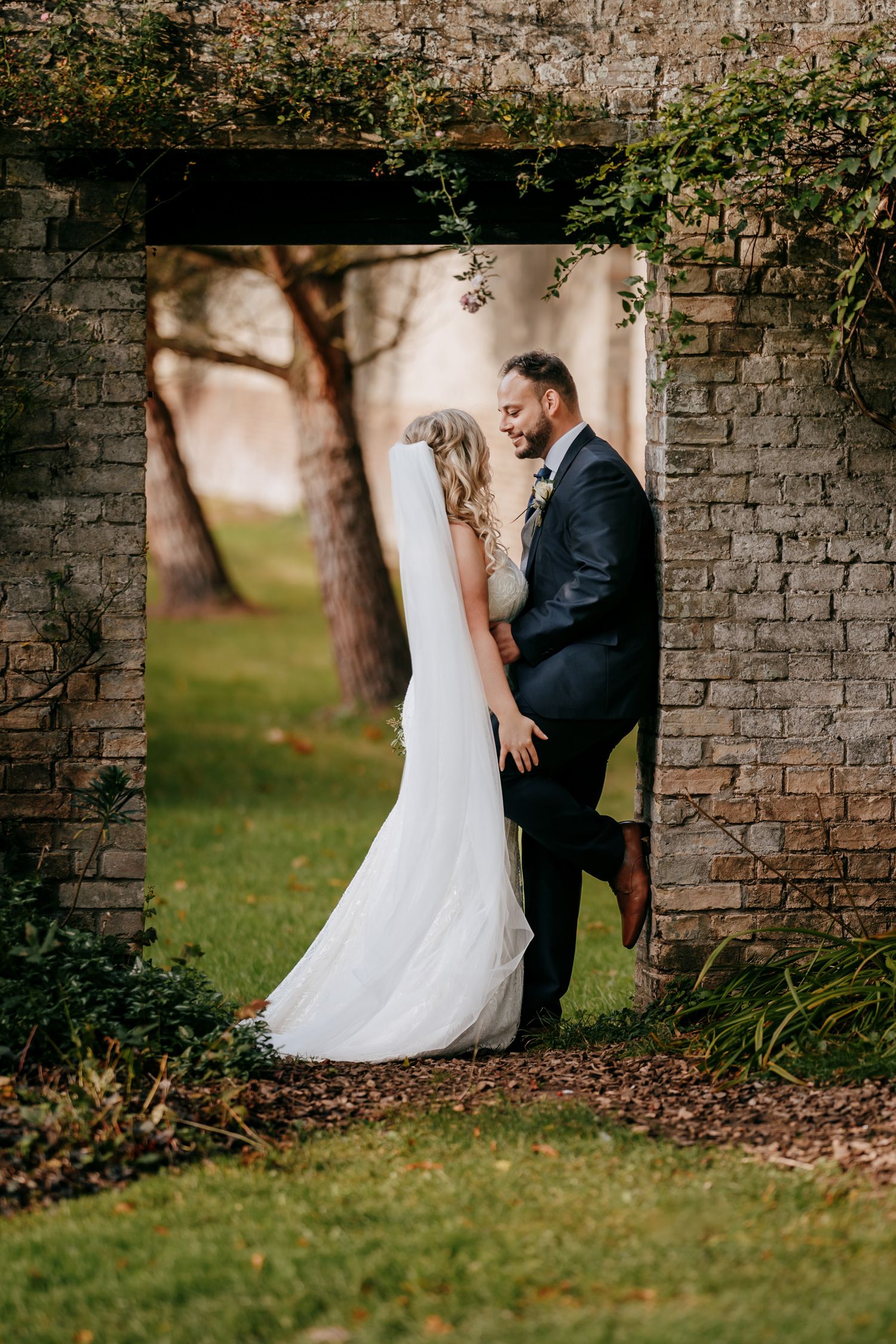 Romantic wedding couple photo at Chippenham Park, Newmarket.