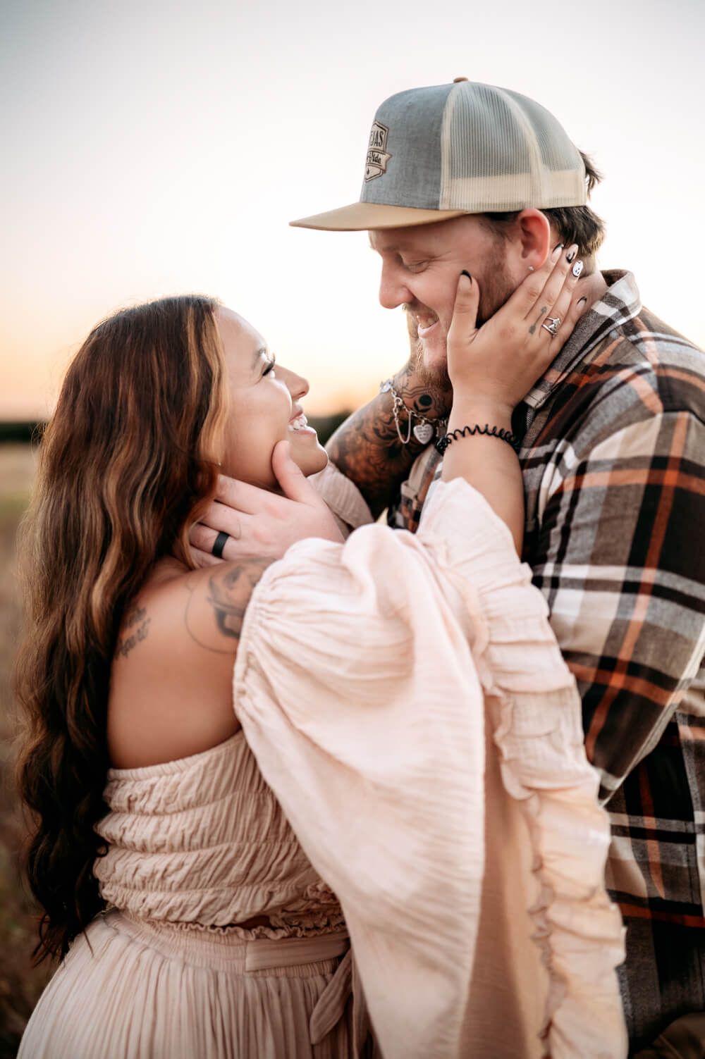 Golden hour couples photography in Central Texas field setting