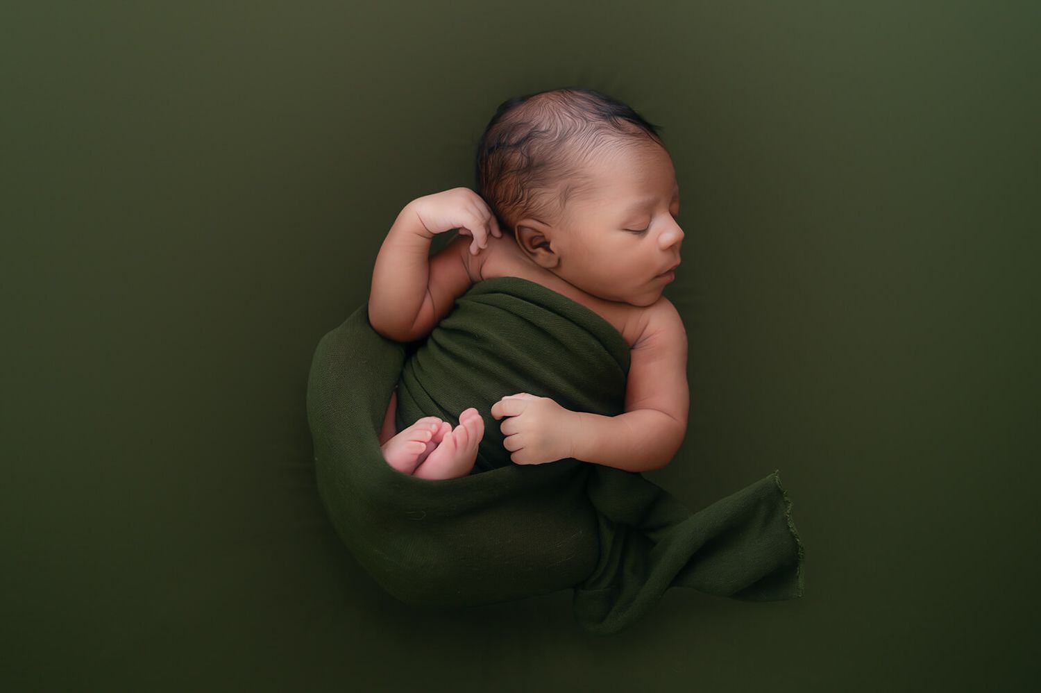 Studio newborn session in Killeen TX with warm olive tones